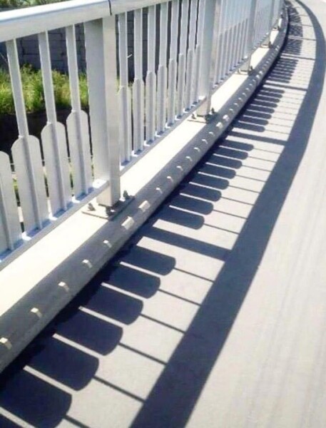 Shadows in Harmony: Crafting a Musical Illusion with a Shadow Railing