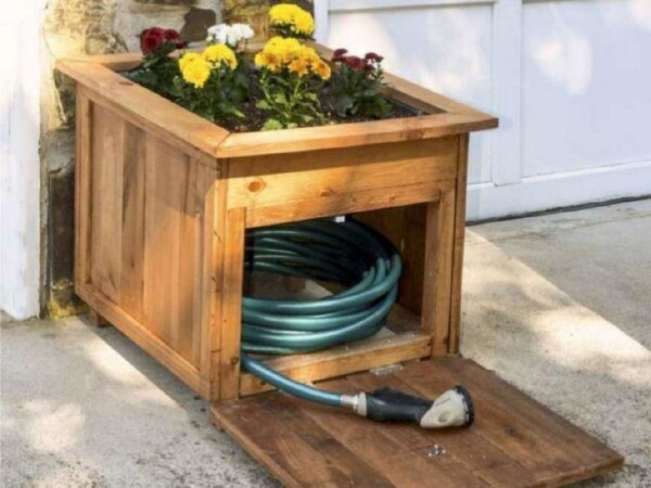 Stylish and Functional: Crafting a Wooden Planter with a Hidden Hose Storage Compartment